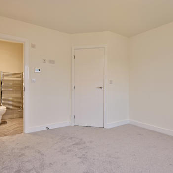 Image showing a bedroom and en suite at 28 Charnwood Street, Swinton.