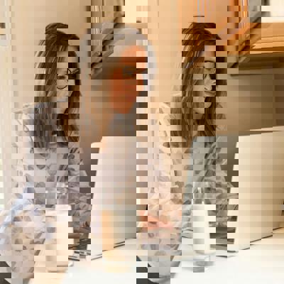 Image of someone working on a laptop.