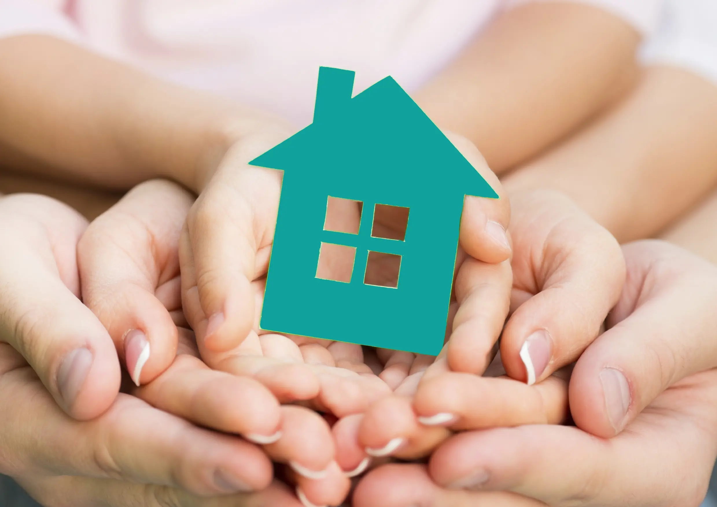 Hands Holding House