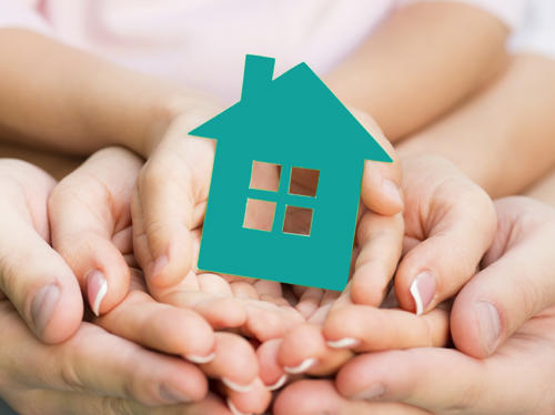Hands Holding House