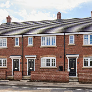 Image of the front of the properties at Farmside Green.