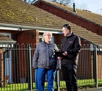 Our Tenant Involvement Officer speaking to a Tenant.